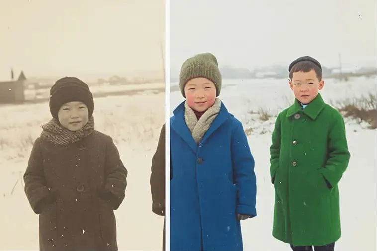 Faded photo of two children in the snow restored to full colour